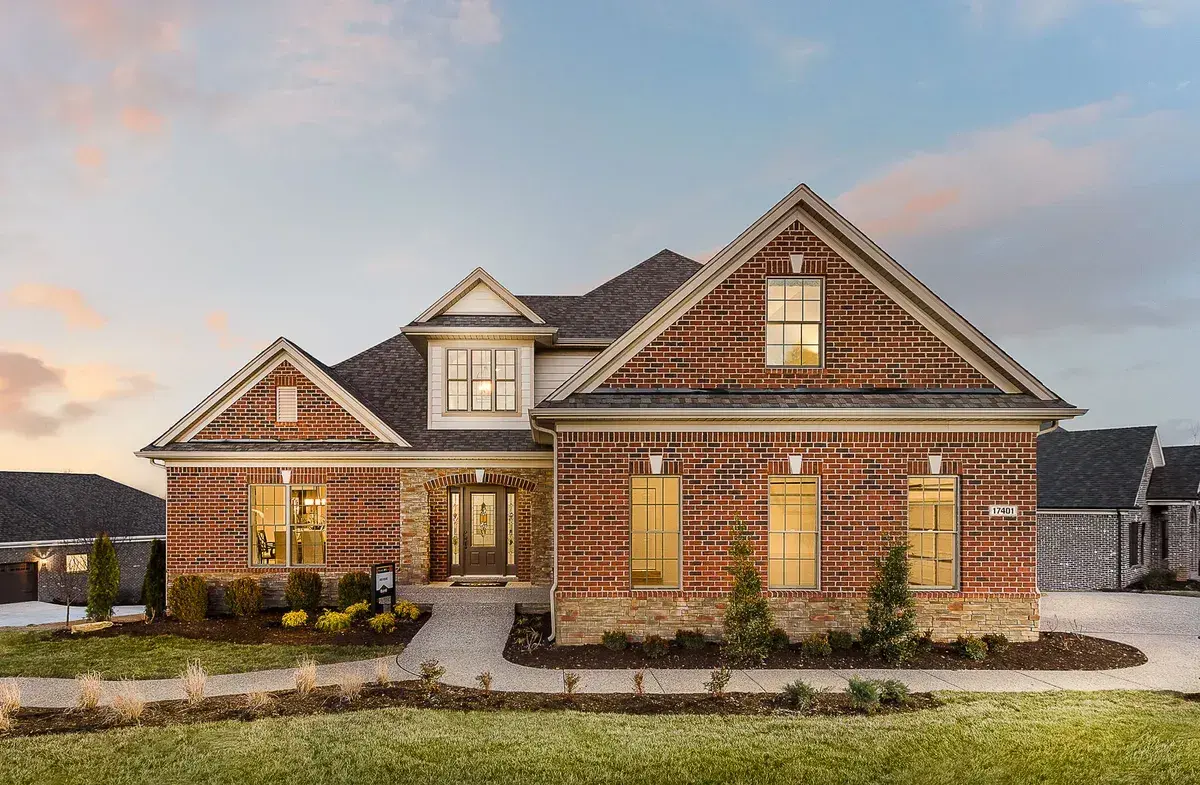 Two-story brick exterior new construction site-built home by Elite Homes, a Clayton company.